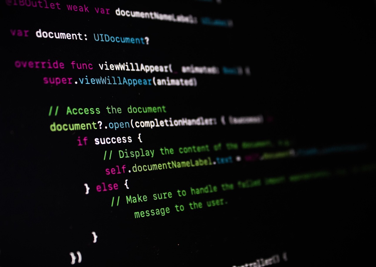 A dark code editor glowing on screen